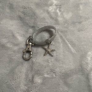 Pocketbac holder band with starfish